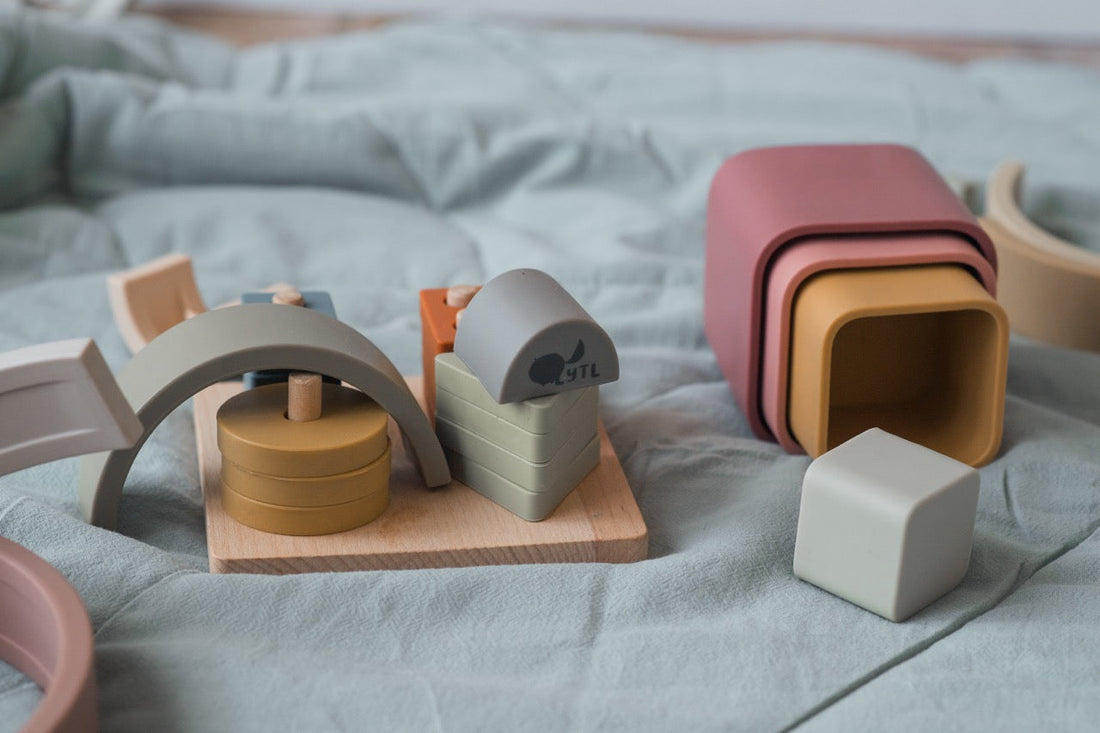 How to choose Montessori toys for toddlers and preschoolers – silicone rainbow stacker, shape puzzle toy, and stacking cups for open-ended learning and fine motor skills