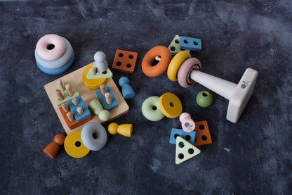 LYTL Sensory Starter Kit with silicone ring stacker, shape puzzle, and mini peg dolls