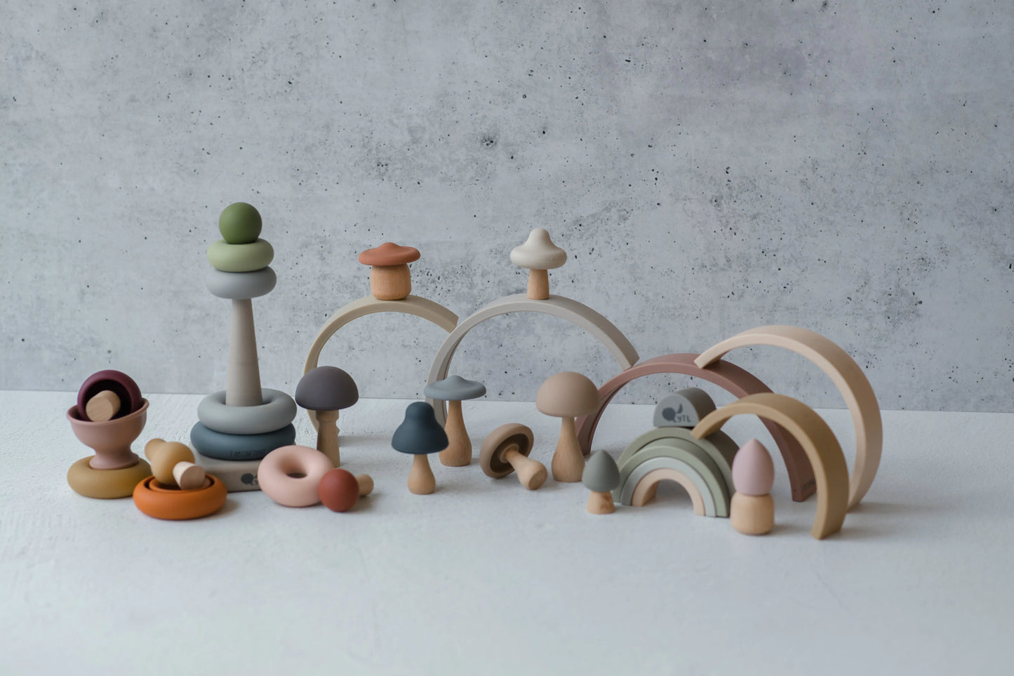 My First Christmas Play Bundle - Close-up of silicone stacking rings and mushroom teether in holiday gift set