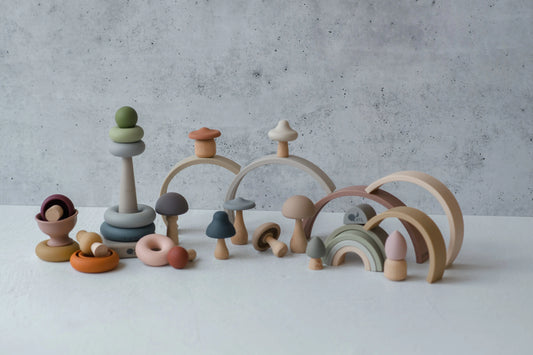 My First Christmas Play Bundle - Close-up of silicone stacking rings and mushroom teether in holiday gift set