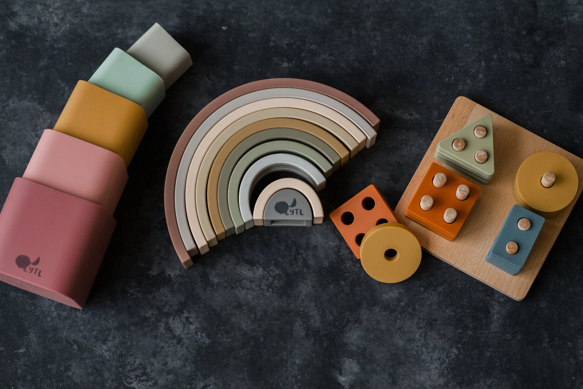 Shape puzzle toy from Jingle & Grow Play Kit — fine motor practice