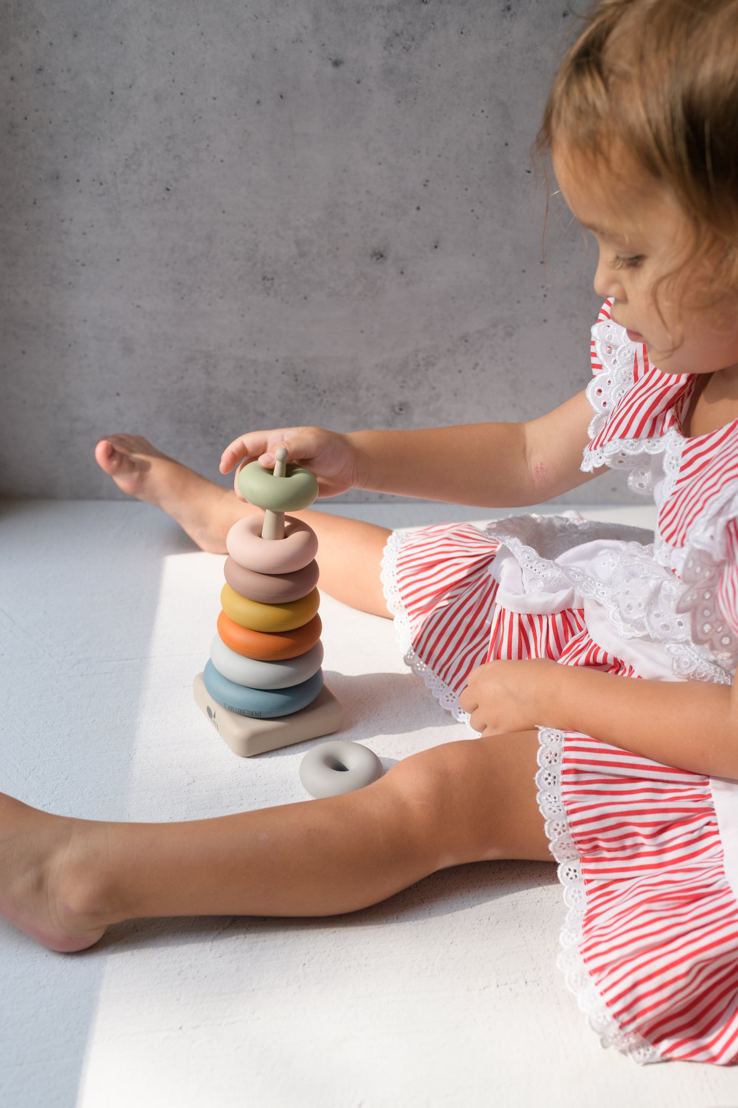 Montessori fine motor toys for grasping, placing, stacking, and matching