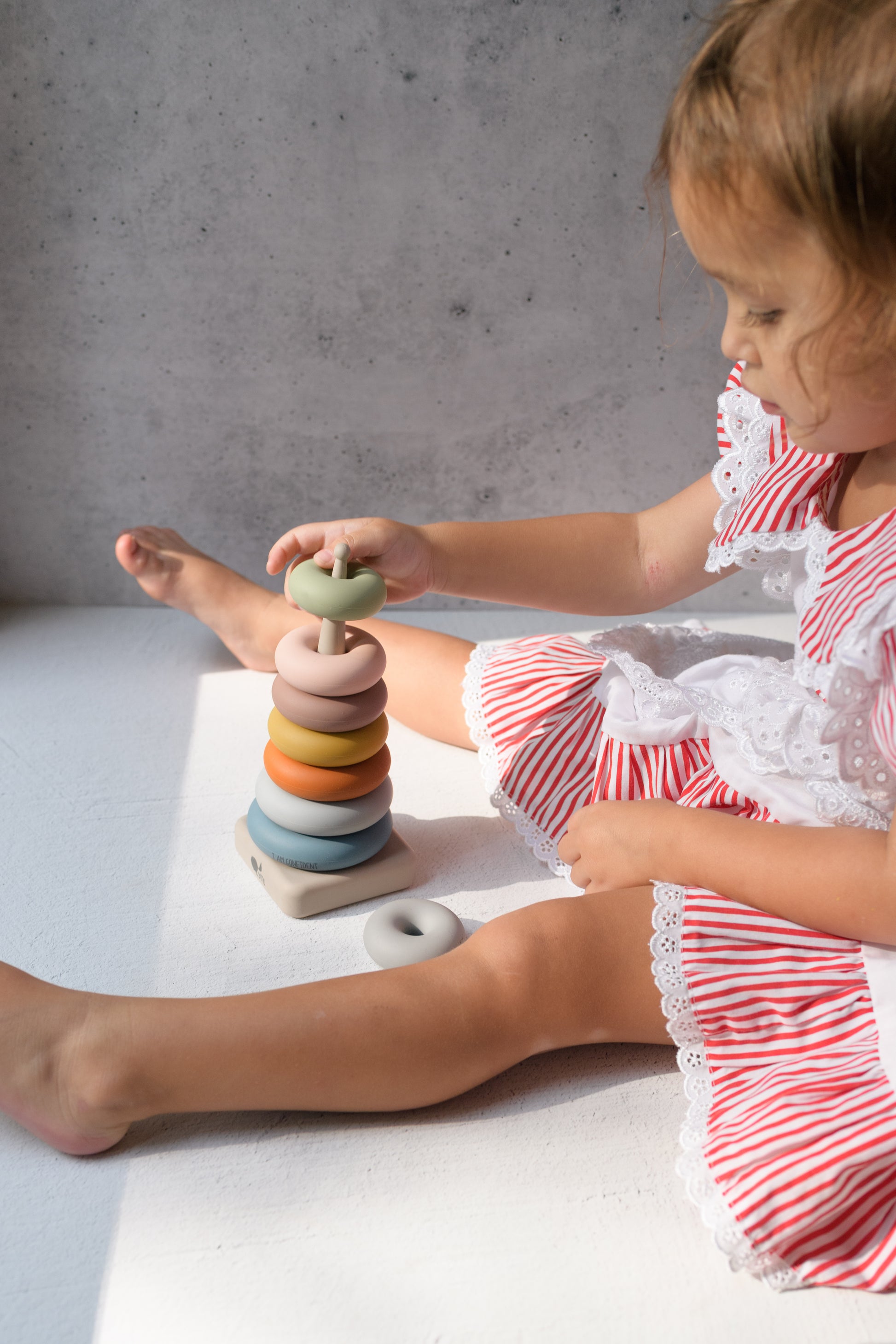Montessori fine motor toys for grasping, placing, stacking, and matching