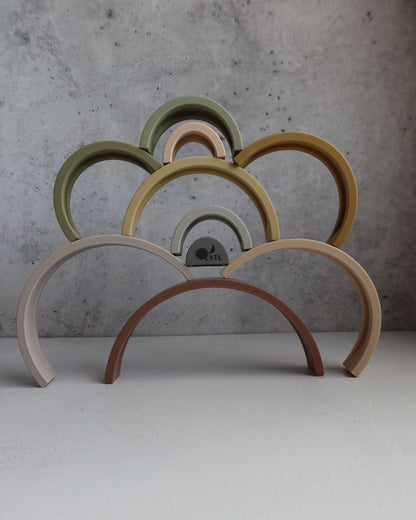 Close-up of 10 layer earthy silicone Montessori rainbow arches for stacking and balancing