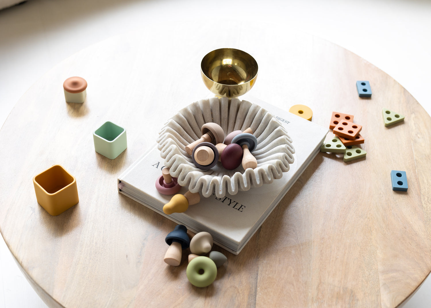 Montessori mushroom mix and match toy, stacking cups, and puzzle shape pieces for fine motor skills and open-ended play