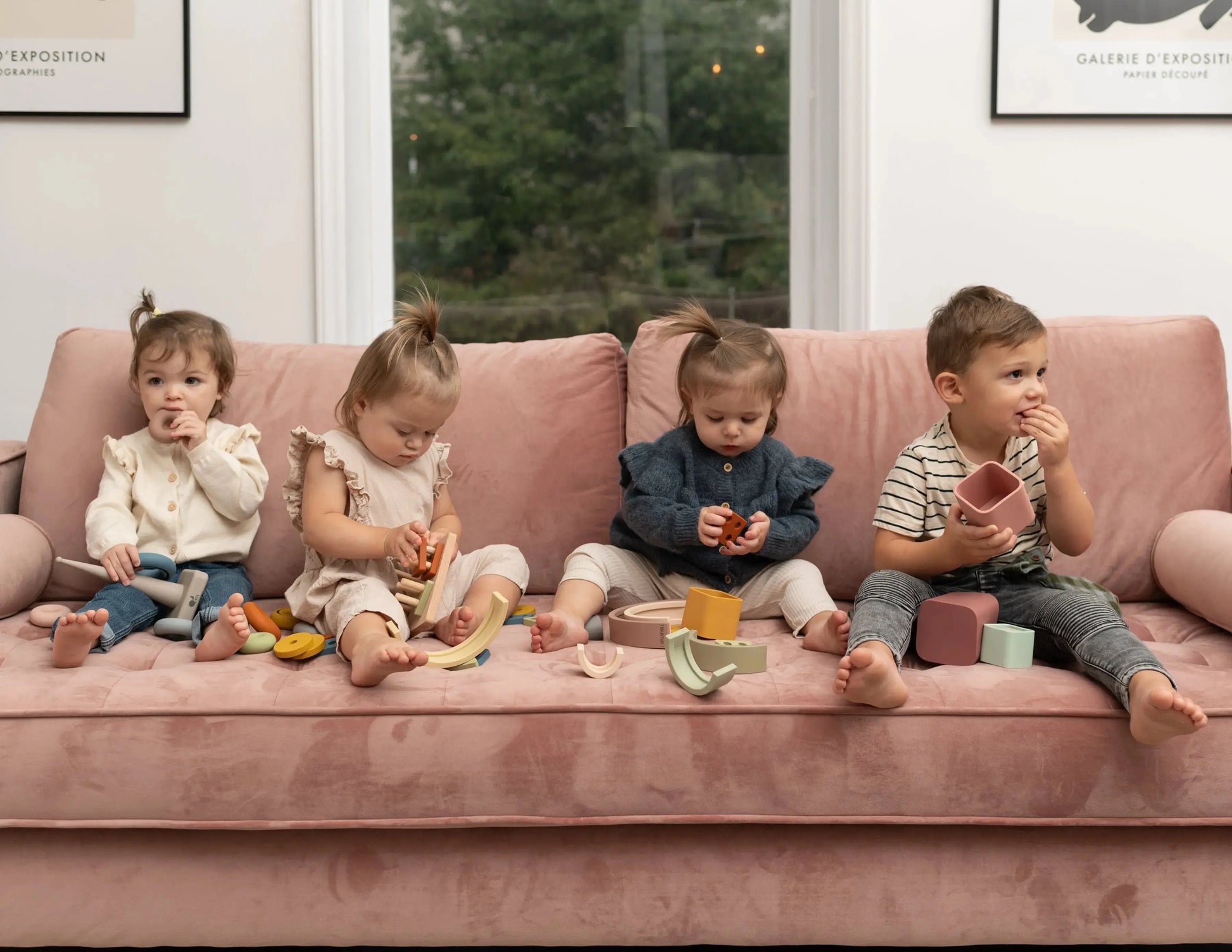 Children using Montessori playroom bundle for open-ended play and learning. Silicone Montessori Toys for development and motor skills.